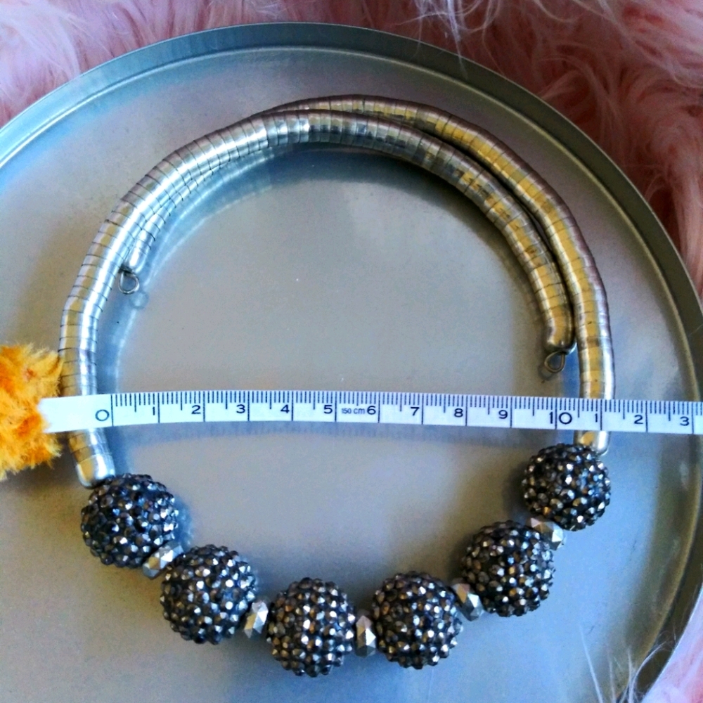 NWOT beaded omega.